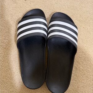 Black Addias Slide Sandals with White Stripes